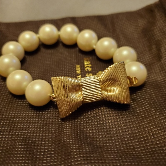 kate spade Jewelry - Kate Spade pearl gold bow bangle